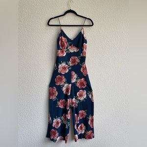 Charlotte Russe blue floral jumpsuit size: M